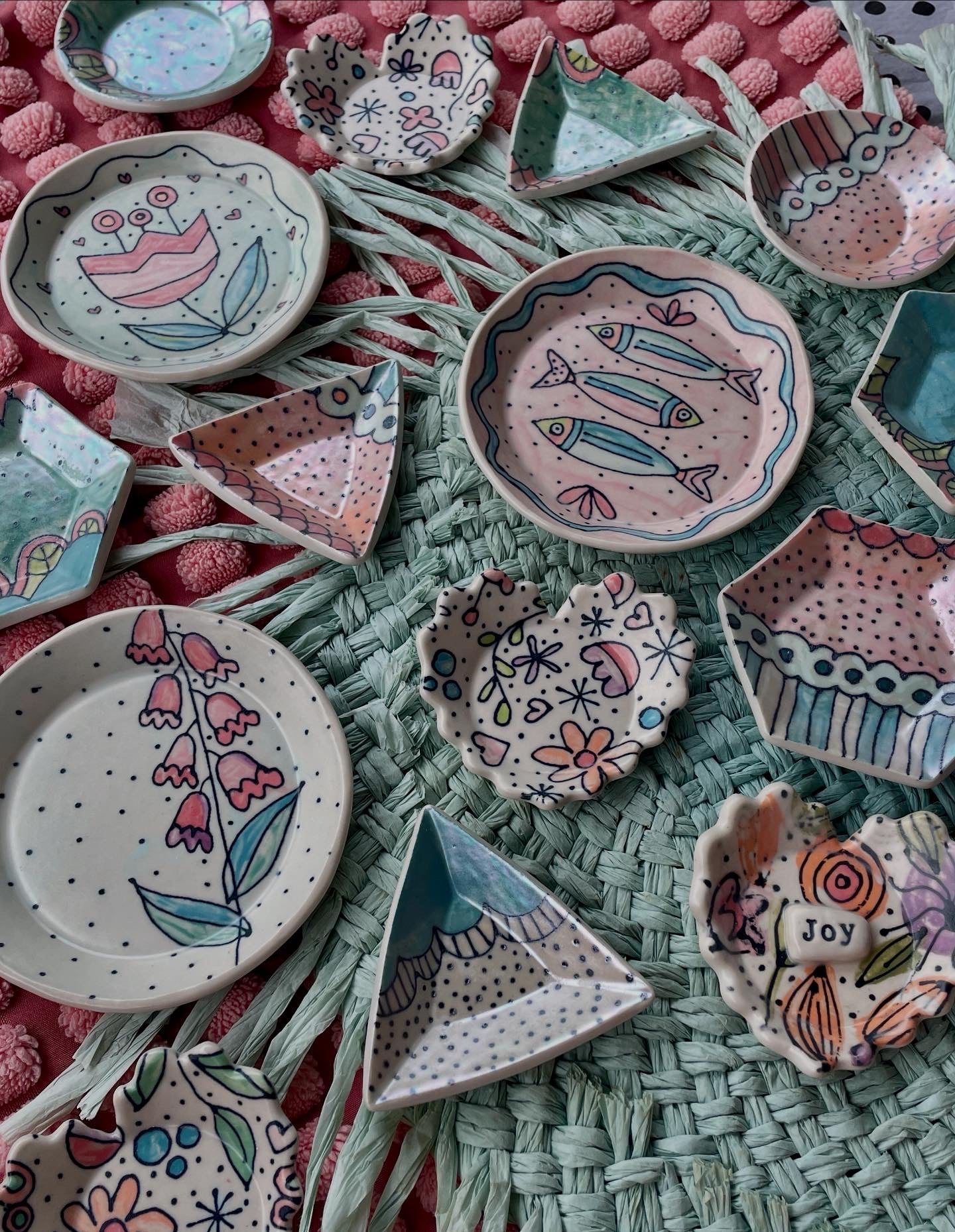 Handmade ceramic trinket dishes with colorful hand painted designs